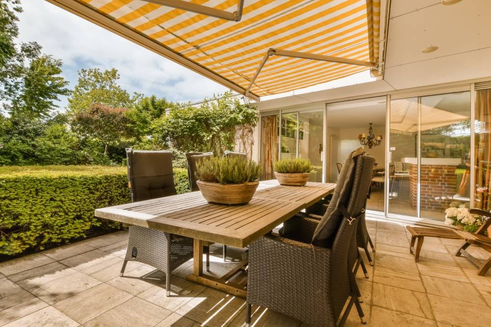An outdoor awning over a small sitting area near Greenwich, Connecticut (CT)
